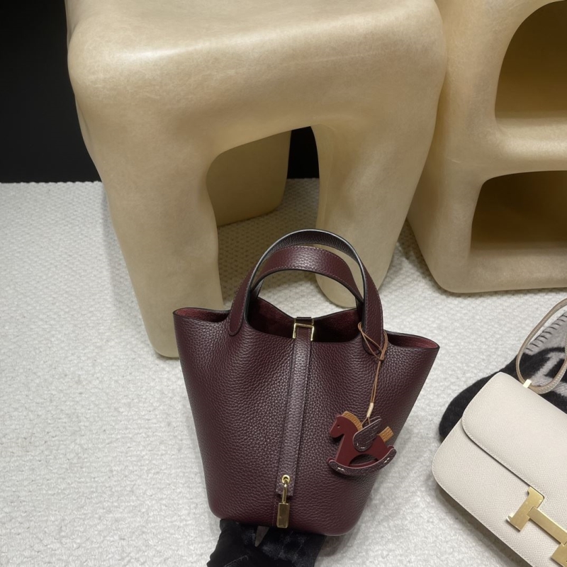 H**mes shopping bags